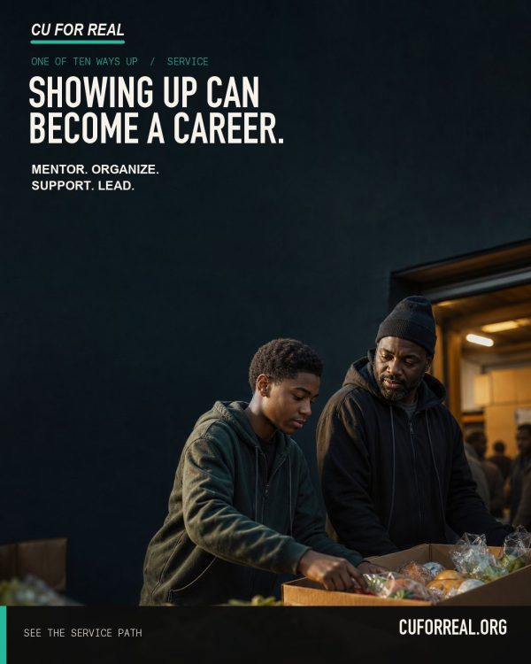 Showing up can become a career. Mentor. Organize. Support. Lead. Two volunteers sorting boxes of food at a donation truck at dusk.